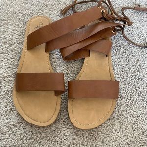 Size 9 sandals. Worn twice, lace up